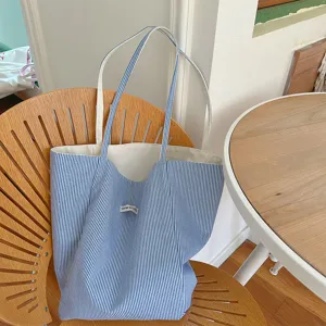 Blue and white striped canvas tote bag, casual commuter shoulder bag with double straps.