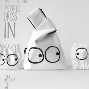 Minimalist canvas tote bag with cute big eyes design, Japanese style mini handbag for daily use.