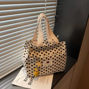 Canvas tote bag with black polka dots, stylish lunch handbag and casual daily purse for women.