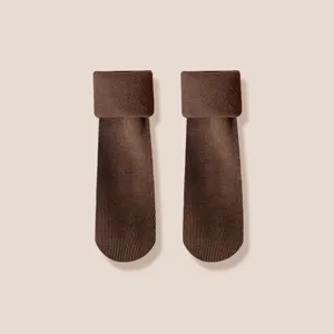 Thickened fleece thermal socks for women, cozy winter mid tube snow socks for home wear.