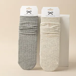 Women cotton slouch socks with cute heart embroidery, warm and stylish mid-tube knit hosiery.