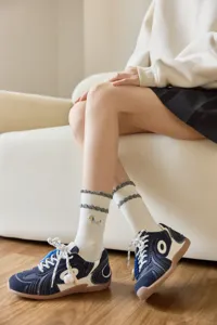 Japanese style cute embroidered socks for women, sweet ruffles and cozy cotton mid-tube design.