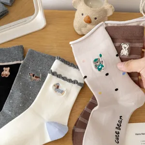 Japanese cute cartoon embroidered mid-calf socks for women, sweet college style detail view.