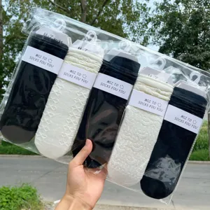 Women slouch socks casual long tube socks knit hosiery black white 5 pairs set packaged.
