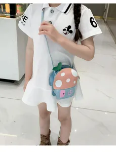 Cute cartoon mushroom house crossbody bag for kids, detailed view showing pink and blue design.