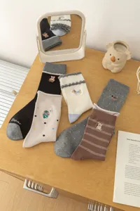 Cute Japanese style cartoon embroidered mid-tube socks with bear patterns for women.
