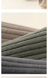 Detailed macro view of men's ribbed knit socks, highlighting fine fabric texture and quality.