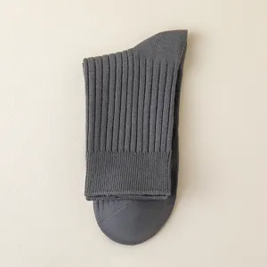Solid color dark gray ribbed cotton men's crew socks for business and casual daily wear.