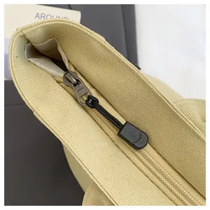 Canvas tote bag zipper detail, minimalist casual daily handbag close up view for students.