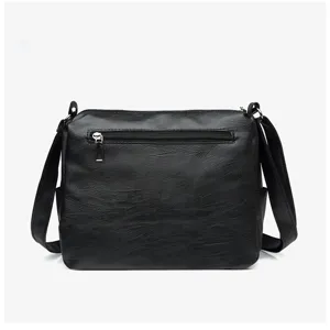 Black PU leather retro crossbody bag detail showing multi-layer design and back zipper pocket.