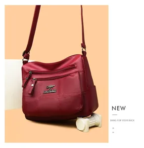 Red PU leather crossbody bag for women, stylish multi-layer retro shoulder handbag with spacious capacity.