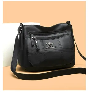 Black PU leather multi-layer crossbody shoulder bag for women, retro design with large capacity.