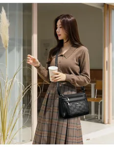 Fashion soft leather women shoulder bag detail, stylish multi-zipper cross-body handbag daily.