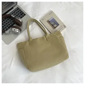 Casual large capacity canvas shoulder bag for women, solid color minimalist tote bag.