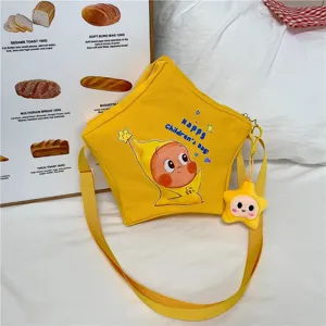 Yellow star-shaped crossbody bag detail showing cute cartoon character design and plush charm.