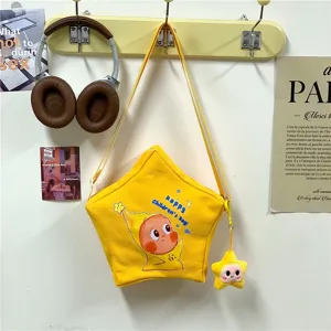 Cute yellow star-shaped canvas crossbody bag with plush pendant for girls and children.