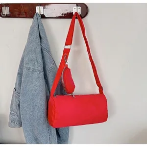 Red oxford cloth barrel shoulder bag with small strap pouch, casual daily crossbody bag for women.