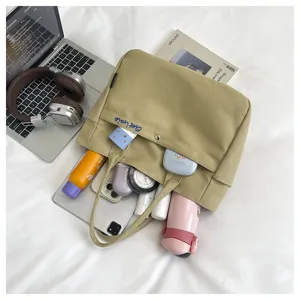 Canvas tote bag large capacity shoulder bag casual handbag for women minimalist everyday style.