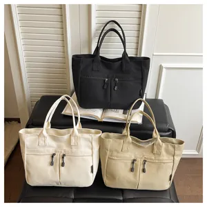 Japanese style canvas tote bag with zipper, casual commuting shoulder bag for students.