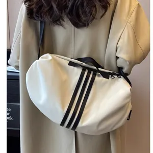 Large capacity casual shoulder bag for women, soft crossbody bag with stylish striped design.
