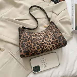Retro leopard print shoulder bag for women, chic underarm purse with trendy niche design.