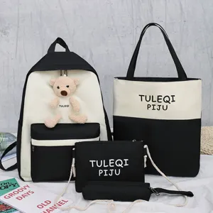 Student canvas backpack set four-piece black and white school bag for teen girls daily use