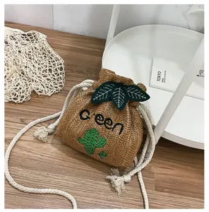 Chic straw bucket bag with cute cactus embroidery, casual crossbody bag for summer daily wear.