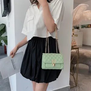 Chic quilted chain shoulder bag for women, elegant fashion crossbody bag with gold hardware.