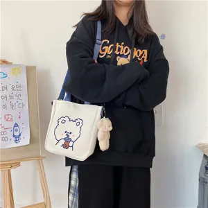 Cute canvas crossbody shoulder bag with adorable boba bear design for daily student use.