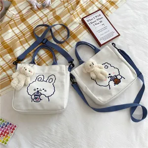 Cute canvas shoulder bag for women, Japanese style crossbody handbag with lovely plush bear pendant.