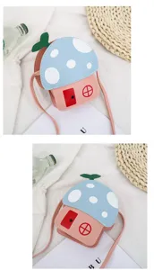 Cute mushroom house design details of the kids crossbody bag with vibrant blue and pink colors.