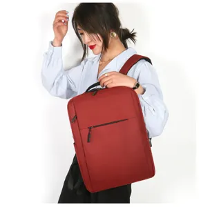 Zaino per laptop rosso minimalista uomo donna viaggio di affari casual uso quotidiano.