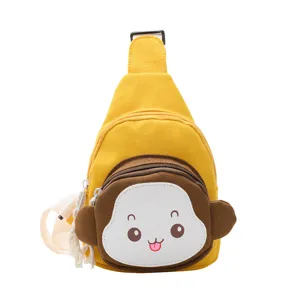 Cute cartoon monkey canvas chest bag for kids, casual yellow sling backpack, lightweight daypack.