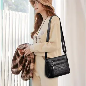 Women black soft leather multi-pocket shoulder bag casual crossbody bag with metal logo
