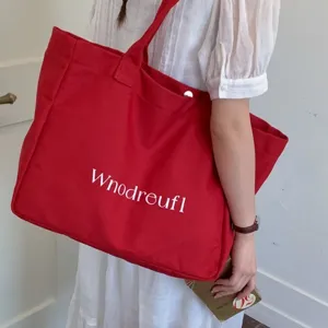 Red canvas tote bag for women, large capacity shoulder bag, casual student crossbody handbag.