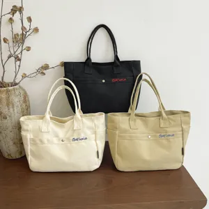 Large capacity canvas tote bag for women, Korean style solid color casual shoulder handbag.