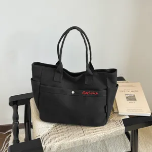 Korean style black canvas tote bag, large capacity minimalist shoulder bag for daily commute.