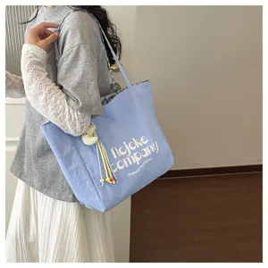 Borsa a tracolla in tela casual minimalista di grande capacità per donne pendolari e studenti.