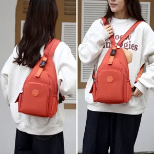 Casual waterproof oxford cloth convertible chest bag and backpack in vibrant orange color.