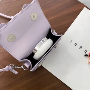 Light purple mini crossbody bag with cute bear ears, PU leather satchel purse for women.