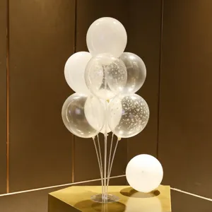 Balloon table stand kit with white and star transparent balloons for party decoration.