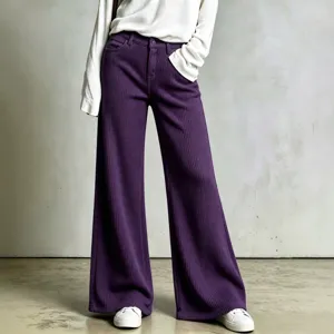Detail view of casual waffle knit wide-leg pants in purple, featuring a relaxed straight fit.