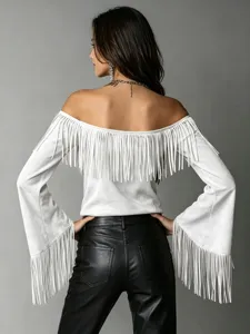Back view detail shot of women off shoulder fringe top and black leather pants western style