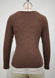 Brown ribbed knit long sleeve top back view showcasing slim fit and textured fabric details.