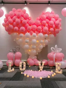 Macaron pink heart balloon arch and LED letters set for romantic party decoration detail view