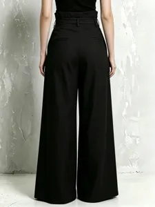 High waist wide leg trousers back view detail, elegant black paperbag pleated design.