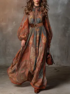Bohemian ethnic print long sleeve maxi dress detail, featuring a stylish wide waist belt.