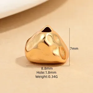 Gold irregular hammered triangle bead detail close-up showing texture, 8.8mm width and 7mm height.