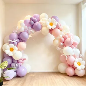 Detailed view of colorful balloon arch setup with daisy foil balloons for party decoration.