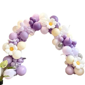 Purple and white balloon arch kit with daisy foil balloons for party and wedding decoration.